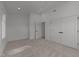 Bedroom featuring neutral carpet, ceiling fan, and multiple closets at 100 Farris Ct, Raleigh, NC 27610