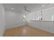 Bright bedroom with hardwood floors, fan, and natural light at 100 Farris Ct, Raleigh, NC 27610