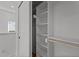 Organized closet with built-in shelving and hanging space, maximizing storage at 100 Farris Ct, Raleigh, NC 27610