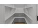 Pantry featuring custom shelving and ample storage at 100 Farris Ct, Raleigh, NC 27610