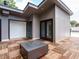 Modern rooftop deck with sleek architectural details, wood flooring, and an inviting outdoor fireplace at 1521 Havenmont Ct, Raleigh, NC 27608