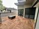 Outdoor deck features a modern deck furniture and a view of the surrounding neighborhood at 1523 Havenmont Ct, Raleigh, NC 27608