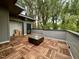 Outdoor deck features a unique wood tile floor and modern deck furniture at 1523 Havenmont Ct, Raleigh, NC 27608