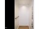 This home features a modern elevator for easy access to all floors, complete with wood-look flooring and simple handrail at 1525 Havenmont Ct, Raleigh, NC 27608