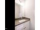 Powder room featuring a sink and a large vanity mirror at 1527 Havenmont Ct, Raleigh, NC 27608
