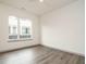 Bright, open bedroom with hardwood floors and natural lighting at 1527 Havenmont Ct, Raleigh, NC 27608