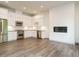 Well-lit kitchen with stainless steel appliances, white cabinetry, and a modern decorative tile backsplash at 1527 Havenmont Ct, Raleigh, NC 27608