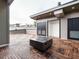 Rooftop deck with wood tile flooring and a modern fire pit table and two storage units at 1527 Havenmont Ct, Raleigh, NC 27608