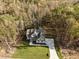 Aerial view of house and property, showcasing wooded setting at 143 Hook Dr # 23, Fuquay Varina, NC 27526