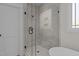 Bathroom with glass shower and hexagon tile floor at 143 Hook Dr # 23, Fuquay Varina, NC 27526