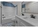 Double vanity bathroom with blue tile and bathtub at 143 Hook Dr # 23, Fuquay Varina, NC 27526