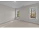 Bright bedroom with two large windows and plush carpeting at 143 Hook Dr # 23, Fuquay Varina, NC 27526