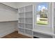 Large walk-in closet with shelving and window at 143 Hook Dr # 23, Fuquay Varina, NC 27526