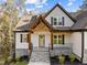 Front entrance with stone details and wooden beams at 143 Hook Dr # 23, Fuquay Varina, NC 27526