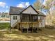 House exterior showcasing a large deck and backyard at 143 Hook Dr # 23, Fuquay Varina, NC 27526