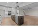 Spacious kitchen with island, stainless steel appliances, and white cabinets at 143 Hook Dr # 23, Fuquay Varina, NC 27526