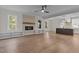 Living room with built-in shelving and a brick fireplace at 143 Hook Dr # 23, Fuquay Varina, NC 27526