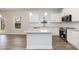 Open kitchen with white cabinets, granite countertops, and stainless steel appliances at 138 New Twin Branch Ct, Smithfield, NC 27577