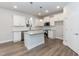 Modern kitchen features white cabinets, granite countertops, and stainless steel appliances at 138 New Twin Branch Ct, Smithfield, NC 27577