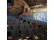 Cozy log cabin-style theater interior showcasing tiered seating at 138 New Twin Branch Ct, Smithfield, NC 27577