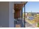 Relaxing balcony with city views, modern glass railings, and comfortable outdoor seating area at 600 N Roxboro St # 24, Durham, NC 27701