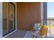 Inviting balcony with seating and views, perfect for relaxation and outdoor enjoyment at 600 N Roxboro St # 24, Durham, NC 27701