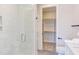 Elegant bathroom features a glass-enclosed shower, stylish vanity, and convenient access to a walk-in closet at 600 N Roxboro St # 24, Durham, NC 27701