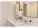 Stylish bathroom with double sinks, framed mirrors, and modern fixtures at 600 N Roxboro St # 24, Durham, NC 27701