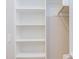 Well-organized closet with shelving and hanging space for efficient storage at 600 N Roxboro St # 24, Durham, NC 27701