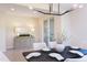 Bright dining room with modern chandelier, setting the stage for memorable gatherings at 600 N Roxboro St # 24, Durham, NC 27701