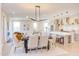 Open concept dining area flows into a modern kitchen and living space, perfect for entertaining guests at 600 N Roxboro St # 24, Durham, NC 27701
