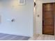 Apartment 41 entrance featuring a modern wooden door and convenient accessibility features at 600 N Roxboro St # 24, Durham, NC 27701