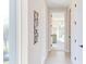 Bright hallway with modern decor, neutral paint, and natural light streaming through the window at 600 N Roxboro St # 24, Durham, NC 27701