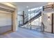 Modern hallway with an elevator and staircase bathed in natural light, creating an inviting atmosphere at 600 N Roxboro St # 24, Durham, NC 27701
