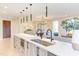 Gourmet kitchen with eat in island and stainless appliances adjoins the dining and living area for easy entertaining at 600 N Roxboro St # 24, Durham, NC 27701