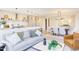 Open concept living area offers an eat-in kitchen, living room with couch, and a formal dining room at 600 N Roxboro St # 24, Durham, NC 27701