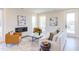 This living room has lots of natural light, modern furniture, hardwood flooring, and a cozy fireplace at 600 N Roxboro St # 24, Durham, NC 27701