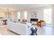 Bright living room with a cozy fireplace, modern furniture, hardwood flooring, and lots of natural light at 600 N Roxboro St # 24, Durham, NC 27701