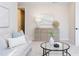 Inviting living room featuring a stylish couch, modern decor, and plenty of natural light at 600 N Roxboro St # 24, Durham, NC 27701