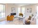 Bright living room with a modern fireplace, seating, and access to the outdoors for seamless indoor-outdoor living at 600 N Roxboro St # 24, Durham, NC 27701