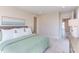 Neutral main bedroom boasts cozy decor, neutral tones, and bright natural light at 600 N Roxboro St # 24, Durham, NC 27701