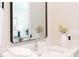 Elegant bathroom featuring a large mirror, marble countertop, and stylish fixtures, offering a spa-like experience at 600 N Roxboro St # 43, Durham, NC 27701