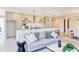Open kitchen featuring bright countertops, ample cabinet space, and a large island with barstool seating at 600 N Roxboro St # 43, Durham, NC 27701