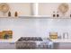 Contemporary kitchen featuring stainless steel appliances, white countertops, and open shelving at 600 N Roxboro St # 43, Durham, NC 27701