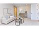 Comfortable living room with stylish decor, including a plush sofa, decorative pillows, and elegant furnishings at 600 N Roxboro St # 43, Durham, NC 27701