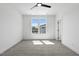 Bedroom with neutral carpet and large windows allowing ample natural light at 2329 E Main St, Durham, NC 27703