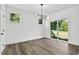 Bright living room with sliding glass doors offers easy access to outdoor space and a sun-filled interior at 2329 E Main St, Durham, NC 27703