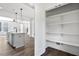 Walk-in pantry next to the kitchen provides ample storage space at 2329 E Main St, Durham, NC 27703