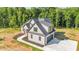 This beautiful new construction is a two story home with an attached two car garage at 4268 Jacks Creek Trl, Burlington, NC 27215