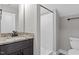 Bathroom with a granite countertop, sink, a standard shower and toilet at 75 Woodbark Cv # 10, Willow Springs, NC 27592
